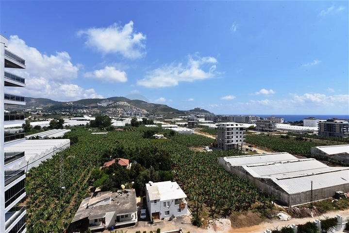 اطلالة بحر وجبل - دوبلكس عائلية واسعة -تصميم 3 غرف نوم وصالتين -في مهموتلار / الانيا 