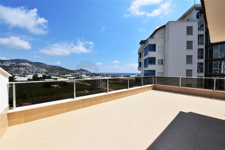 اطلالة بحر وجبل - دوبلكس عائلية واسعة -تصميم 3 غرف نوم وصالتين -في مهموتلار / الانيا 