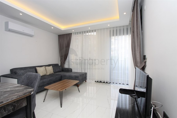 موقع مميز -مجمع سكني جديد -شقة غرفة وصالة في مركز الانيا 