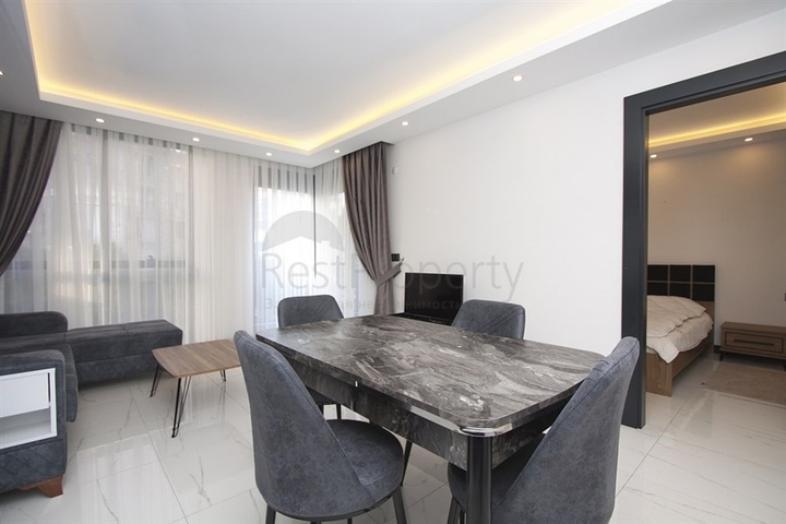 موقع مميز -مجمع سكني جديد -شقة غرفة وصالة في مركز الانيا 