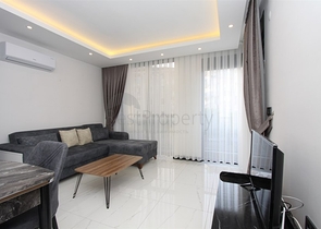 موقع مميز -مجمع سكني جديد -شقة غرفة وصالة في مركز الانيا 