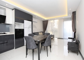 موقع مميز -مجمع سكني جديد -شقة غرفة وصالة في مركز الانيا 