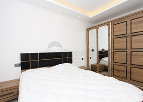 موقع مميز -مجمع سكني جديد -شقة غرفة وصالة في مركز الانيا 