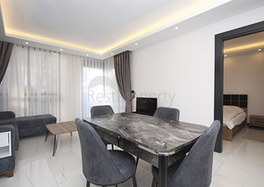 موقع مميز -مجمع سكني جديد -شقة غرفة وصالة في مركز الانيا 