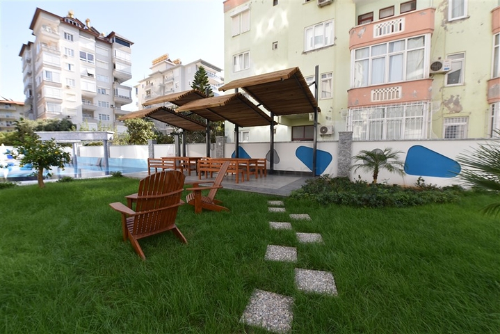 موقع مركزي - شقة 1+1 - واسعة نسبيا -  في مركز الانيا 