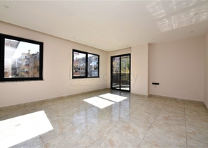 موقع مركزي - شقة 1+1 - واسعة نسبيا -  في مركز الانيا 