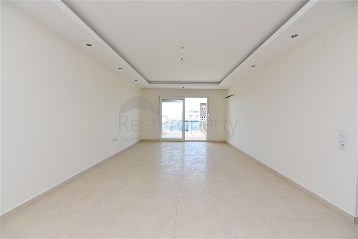 شقة 1+1 غرفة وصالة - في مجمع يضم كافة الخدمات -في مهموتلار / الانيا 