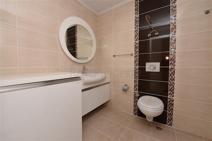 شقة 1+1 غرفة وصالة - في مجمع يضم كافة الخدمات -في مهموتلار / الانيا 