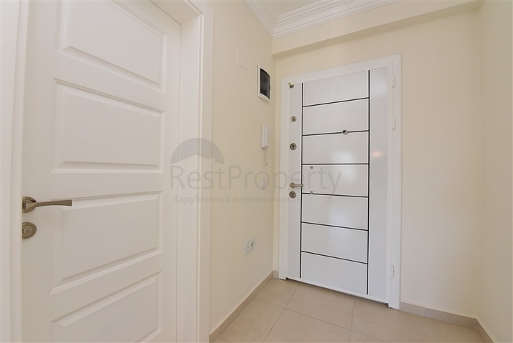 شقة 1+1 غرفة وصالة - في مجمع يضم كافة الخدمات -في مهموتلار / الانيا 