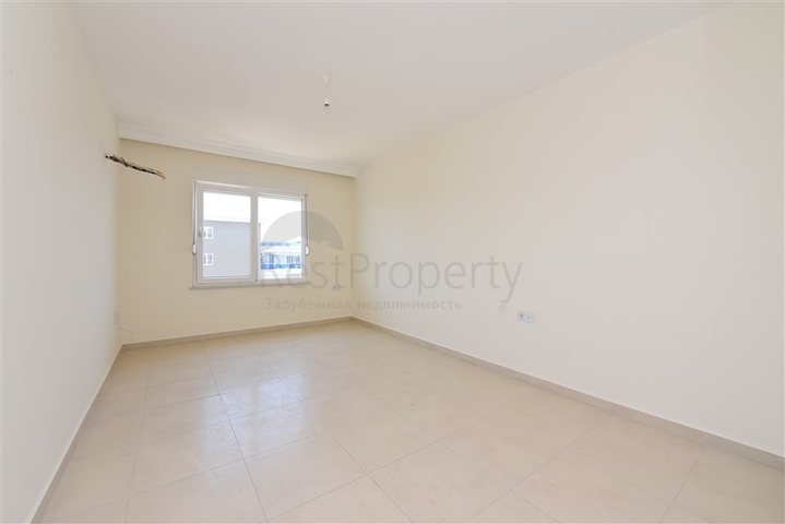 شقة 1+1 غرفة وصالة - في مجمع يضم كافة الخدمات -في مهموتلار / الانيا 