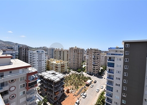 شقة 1+1 غرفة وصالة - في مجمع يضم كافة الخدمات -في مهموتلار / الانيا 