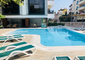 موقع مميز -شقة 2 غرفة وصالة -ضمن مجمع سكني حديث في قلب مدينة الانيا 