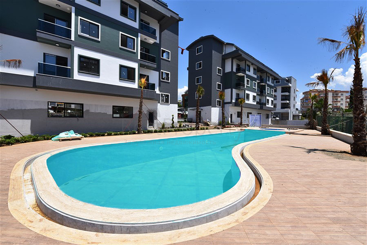 مناسبة للاستثمار - شقة ضمن مجمع جديد - تصميم 1+1 - في اوبا / الانيا 