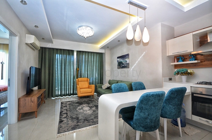 اطلالة بحر - شقة ضمن مجمع فاخر - تصميم 1+1 - في مهموتلار /الانيا 