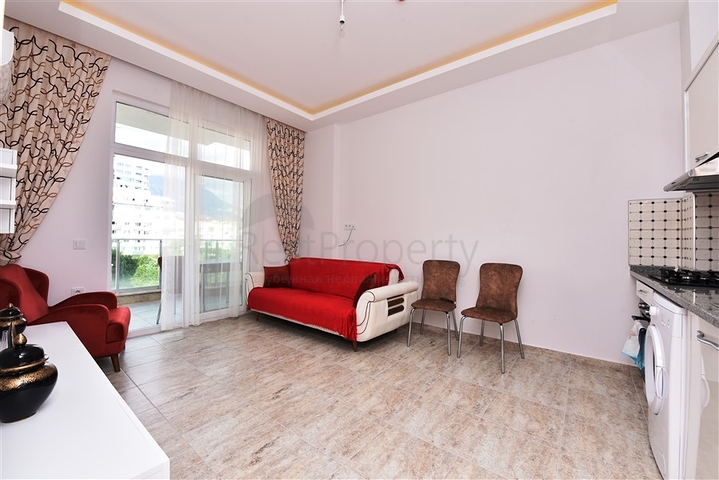 موقع مركزي -شقة غرفة وصالة  -مؤثثة -في مهموتلار / الانيا 