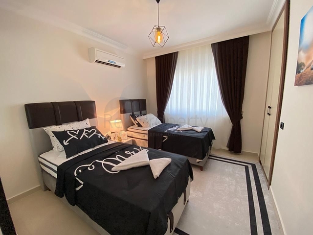 شقة عائلية انيقة -تصميم 1+2 - في مهموتلار / الانيا 