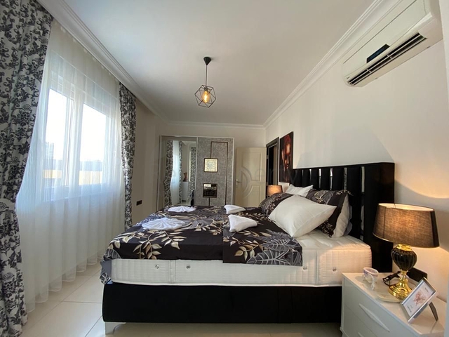 شقة عائلية انيقة -تصميم 1+2 - في مهموتلار / الانيا 