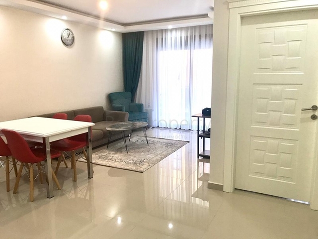 شقة غرفة وصالة - مفروشة - ضمن مجمع انيق - مهموتلار / الانيا 