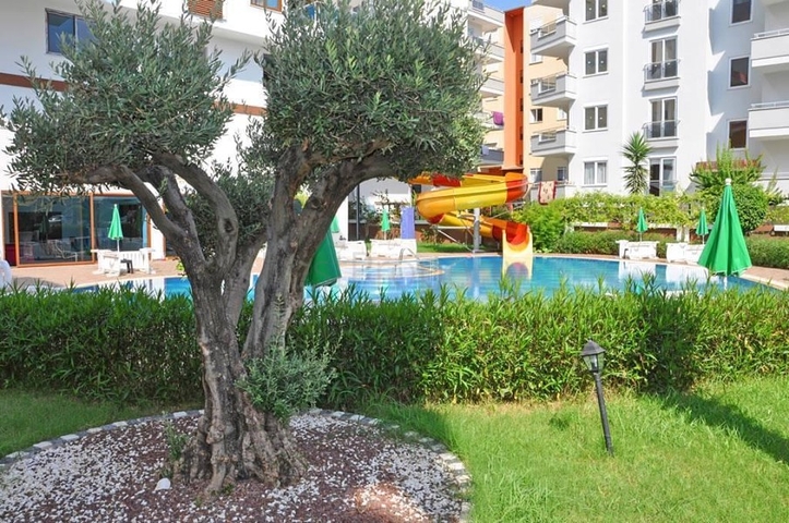 شقة غرفة وصالة - مفروشة - ضمن مجمع انيق - مهموتلار / الانيا 