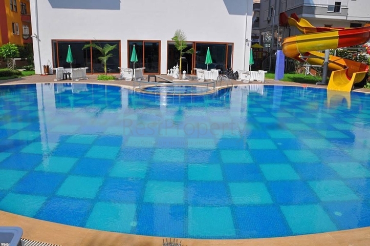 شقة غرفة وصالة - مفروشة - ضمن مجمع انيق - مهموتلار / الانيا 