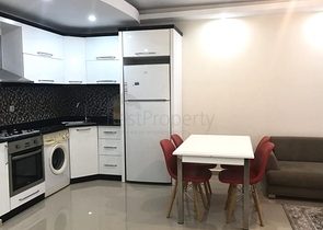 شقة غرفة وصالة - مفروشة - ضمن مجمع انيق - مهموتلار / الانيا 