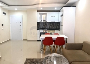 شقة غرفة وصالة - مفروشة - ضمن مجمع انيق - مهموتلار / الانيا 