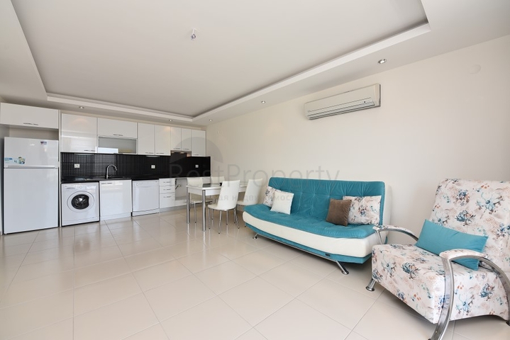 مجمع يضم كافة الخدمات -شقة غرفة وصالة -مؤثثة -في افسلار / الانيا 