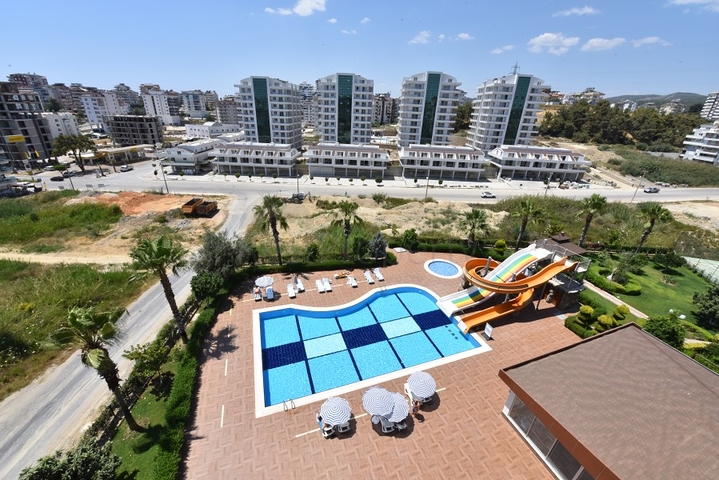 مجمع يضم كافة الخدمات -شقة غرفة وصالة -مؤثثة -في افسلار / الانيا 