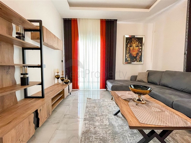 شقة غرفة وصالة  مفروشة بأناقة -ضمن مجمع سكني -في مهموتلار / الانيا 