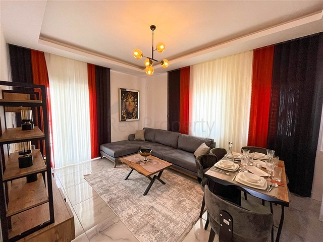 شقة غرفة وصالة  مفروشة بأناقة -ضمن مجمع سكني -في مهموتلار / الانيا 