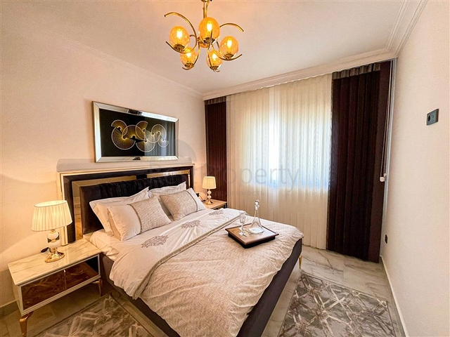 شقة غرفة وصالة  مفروشة بأناقة -ضمن مجمع سكني -في مهموتلار / الانيا 