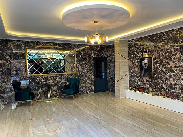 شقة غرفة وصالة  مفروشة بأناقة -ضمن مجمع سكني -في مهموتلار / الانيا 