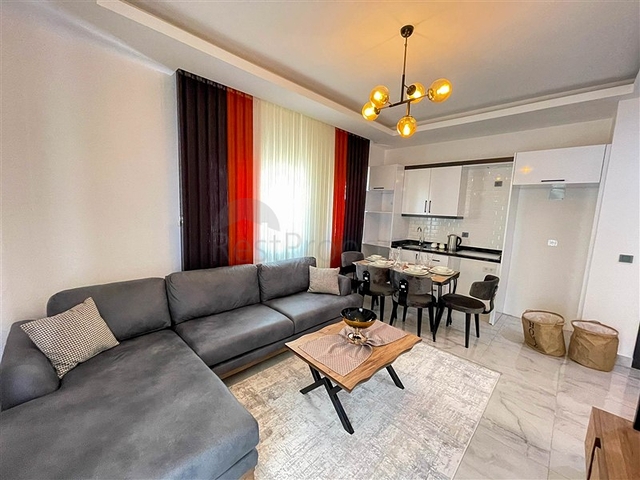 شقة غرفة وصالة  مفروشة بأناقة -ضمن مجمع سكني -في مهموتلار / الانيا 