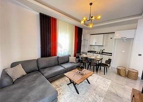 شقة غرفة وصالة  مفروشة بأناقة -ضمن مجمع سكني -في مهموتلار / الانيا 