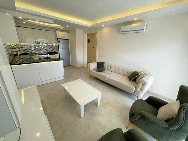 شقة غرفة وصالة -ضمن مجمع سكني - قريب من البحر والخدمات -في مهموتلار / الانيا 