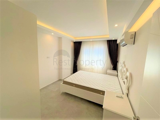 شقة غرفة وصالة -ضمن مجمع سكني - قريب من البحر والخدمات -في مهموتلار / الانيا 