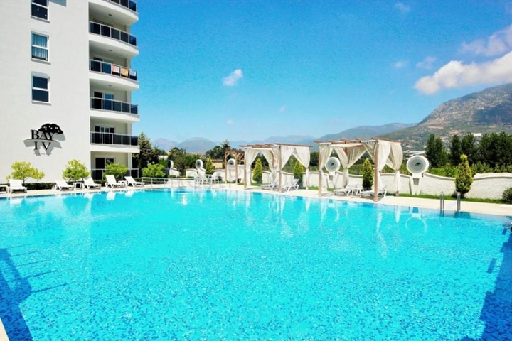 شقة غرفة وصالة -ضمن مجمع سكني - قريب من البحر والخدمات -في مهموتلار / الانيا 