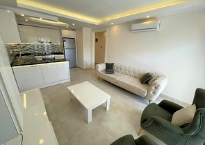 شقة غرفة وصالة -ضمن مجمع سكني - قريب من البحر والخدمات -في مهموتلار / الانيا 