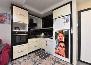 شقة مفروشة -تصميم 1+1 -ضمن مجمع سكني -في مهموتلار / الانيا 