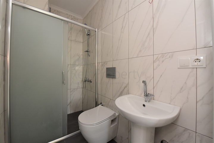 شقة غرفتين وصالة - ضمن مجمع حديث -في مركز الانيا 