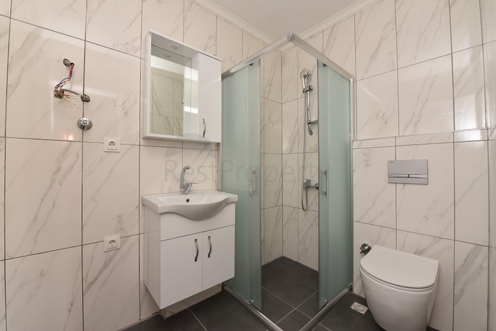 شقة غرفتين وصالة - ضمن مجمع حديث -في مركز الانيا 