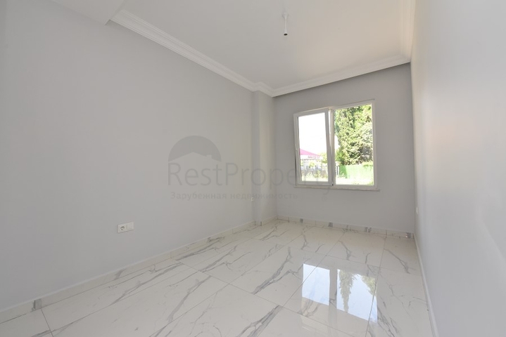 شقة غرفتين وصالة - ضمن مجمع حديث -في مركز الانيا 