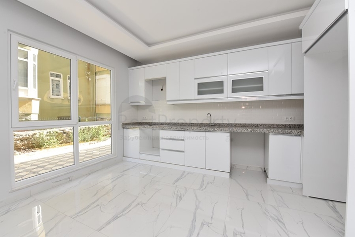 شقة غرفتين وصالة - ضمن مجمع حديث -في مركز الانيا 