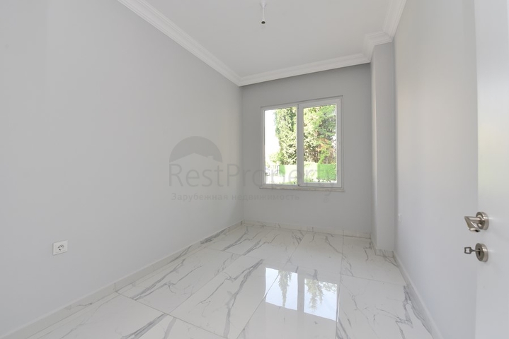 شقة غرفتين وصالة - ضمن مجمع حديث -في مركز الانيا 