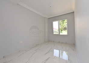 شقة غرفتين وصالة - ضمن مجمع حديث -في مركز الانيا 