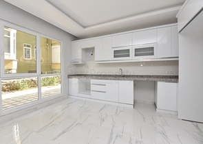 شقة غرفتين وصالة - ضمن مجمع حديث -في مركز الانيا 