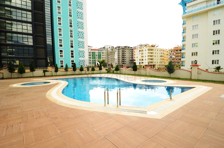 اطلالة بحر - شقة 1+1 - ضمن مجمع سكني -في مهموتلار / الانيا 