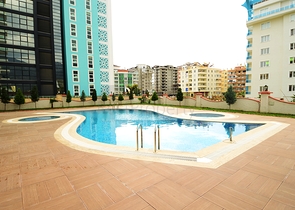 اطلالة بحر - شقة 1+1 - ضمن مجمع سكني -في مهموتلار / الانيا 