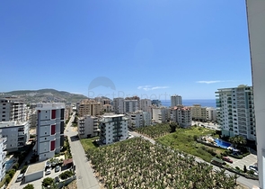 اطلالة بحر - شقة 1+1 - ضمن مجمع سكني -في مهموتلار / الانيا 