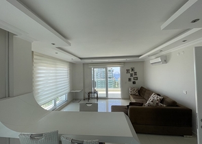 اطلالة بحر - شقة 1+1 - ضمن مجمع سكني -في مهموتلار / الانيا 